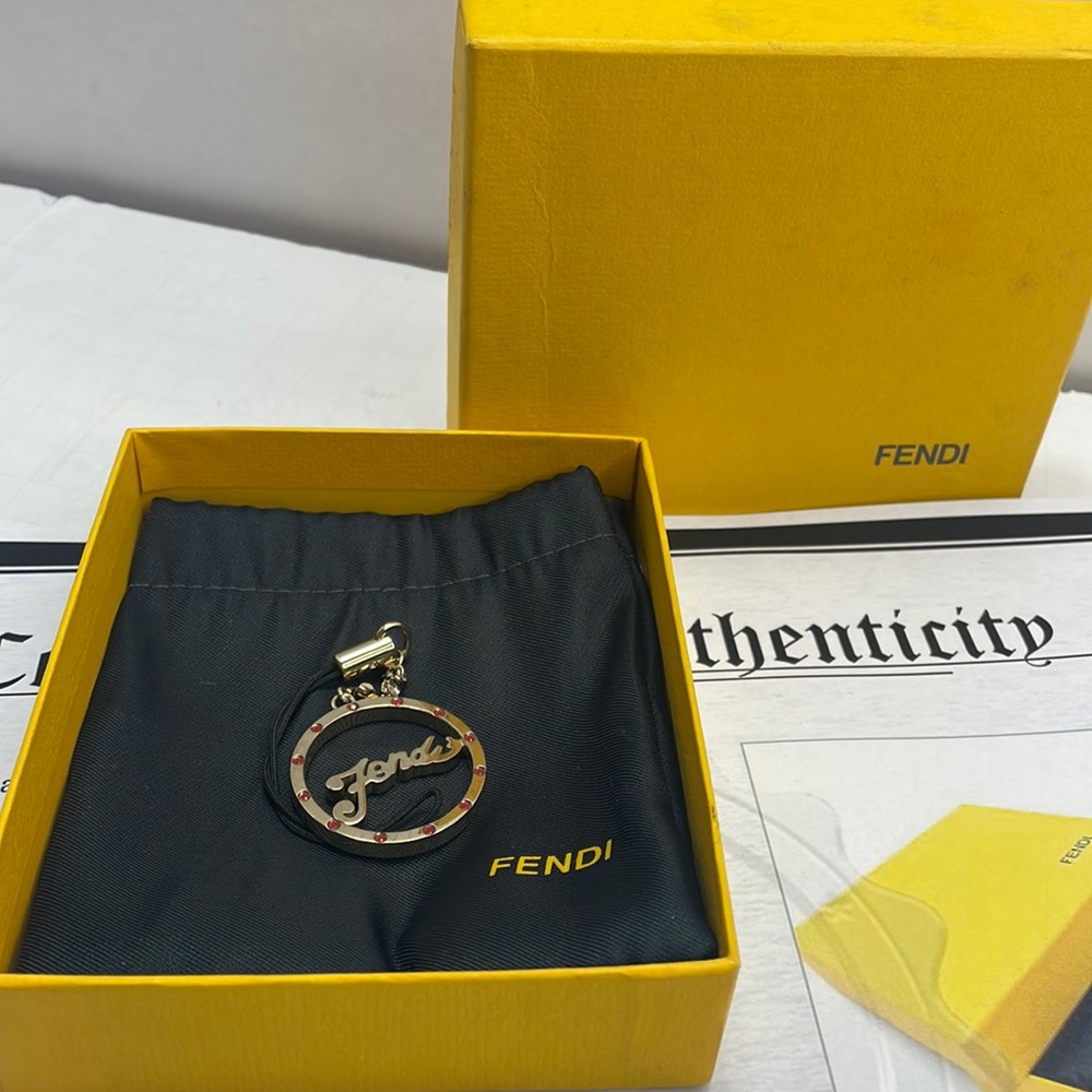 Authentic FENDI key/bag/phone charm with box dustbag and COA